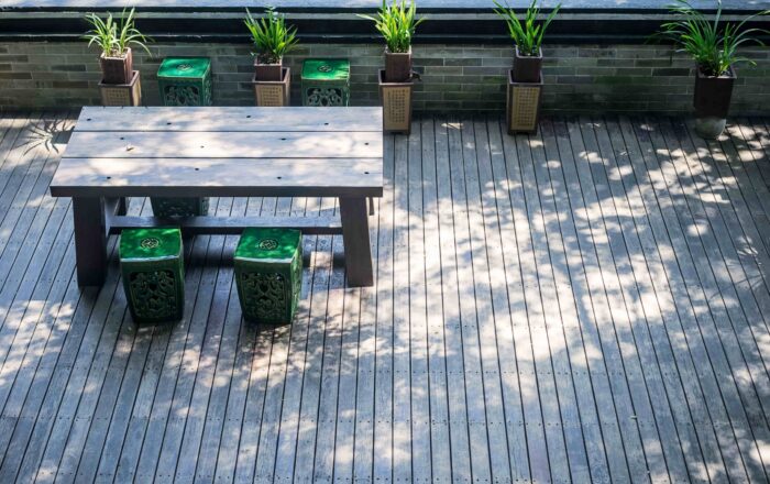 terrace-with-wooden-table-plants